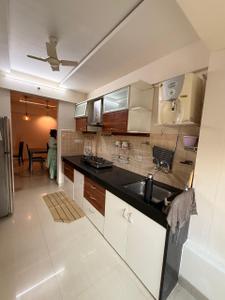 Kitchen Image of 1150 Sq.ft 2 BHK Apartment / Flat for sale in Karia Konark Orchid, Wagholi Pune for Rs. 9300000