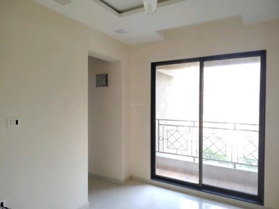 Living Room Image of 550 Sq.ft 1 BHK Apartment / Flat for rent in Puraniks Kanchan Pushp Society, Kasarvadavali Thane for Rs. 19000
