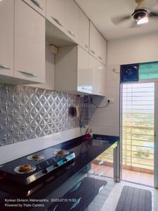 Kitchen Image of 970 Sq.ft 2 BHK Apartment / Flat for rent in Om Paraiso, Padle Gaon Thane for Rs. 22000