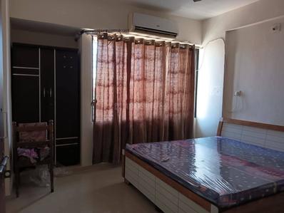 Bedroom Image of 1150 Sq.ft 2 BHK Apartment / Flat for rent in Aawaass River Front, Randesan Gandhinagar for Rs. 20000