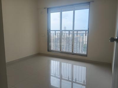 Bedroom Image of 615 Sq.ft 1 BHK Apartment / Flat for sale in Paradigm Pushpanjali Residency Phase III, Thane West Thane for Rs. 5200000