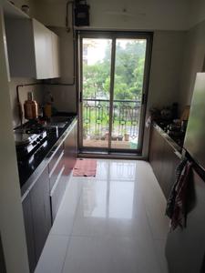 Kitchen Image of 1050 Sq.ft 2 BHK Apartment / Flat for rent in Hiranandani Estate Thane for Rs. 34000
