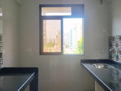 Kitchen Image of 710 Sq.ft 1 BHK Apartment / Flat for sale in Shubh Iconic, Ambernath East Ambernath for Rs. 3699999