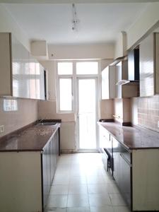 Kitchen Image of 1325 Sq.ft 3 BHK Apartment / Flat for sale in Amrapali Zodiac by Amrapali Group, Sector 120 Noida for Rs. 11600000