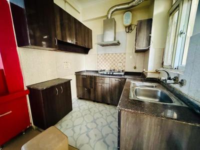 Kitchen Image of 915 Sq.ft 2 BHK Apartment / Flat for rent in Amrapali Princely Estate, Sector 76 Noida for Rs. 35000