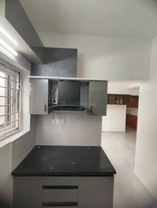 Kitchen Image of 829 Sq.ft 2 BHK Apartment / Flat for rent in Jain Aadhidev, Manapakkam Chennai for Rs. 35000