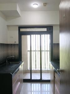 Kitchen Image of 900 Sq.ft 2 BHK Apartment / Flat for rent in Lodha Splendora Riverview, Kasarvadavali Thane for Rs. 26000