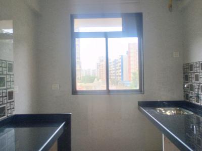 Kitchen Image of 690 Sq.ft 1 BHK Apartment / Flat for sale in Rkr Precious Empire Wing A B And C, Ambernath East Ambernath for Rs. 2616590