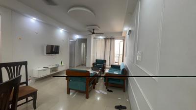 Living Room Image of 1040 Sq.ft 2 BHK Apartment / Flat for rent in Logix Blossom County, Sector 137 Noida for Rs. 40000