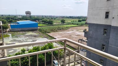 Balcony Image of 585 Sq.ft 1 BHK Apartment / Flat for rent in Aditya Urban Homes Phase 1A, Bamheta Village Ghaziabad for Rs. 13000