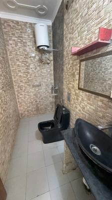 Bathroom Image of 700 Sq.ft 1 BHK Builder Floor for rent in Sector 57 Gurgaon for Rs. 25000