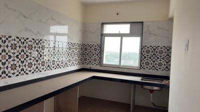 Kitchen Image of 680 Sq.ft 1 BHK Apartment / Flat for sale in Sadguru Nakshtra, Titwala Thane for Rs. 2990000