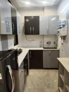 Kitchen Image of 900 Sq.ft 2 BHK Builder Floor for rent in Tagore Garden Extension New Delhi for Rs. 42000