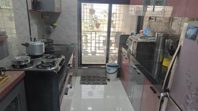 Kitchen Image of 945 Sq.ft 2 BHK Apartment / Flat for sale in Nirman Valeria, Mulund East Mumbai for Rs. 14400000