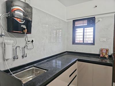 Kitchen Image of 850 Sq.ft 2 BHK Apartment / Flat for sale in Umiya Dreams Icon by Umiya Realty, Wagholi Pune for Rs. 5451000