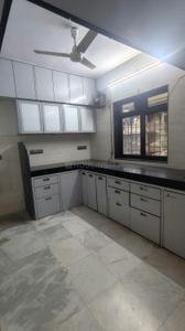 Kitchen Image of 858 Sq.ft 2 BHK Apartment / Flat for rent in Aarti Awashkar Complex, Kandivali West Mumbai for Rs. 48000