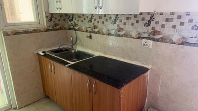 Kitchen Image of 1100 Sq.ft 3 BHK Apartment / Flat for rent in Gaurs Siddhartham, Siddharth Vihar Ghaziabad for Rs. 24500