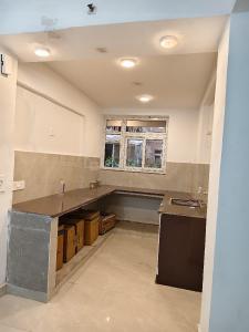 Kitchen Image of 1210 Sq.ft 2.5 BHK Apartment / Flat for sale in Sikka Karmic Greens, Sector 78 Noida for Rs. 8900000