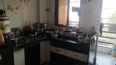 Kitchen Image of 750 Sq.ft 1 BHK Apartment / Flat for sale in Shaileshbhai Gonawala Sai Mohan Flats, Gabheni Surat for Rs. 1600000