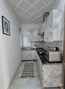 Kitchen Image of 1050 Sq.ft 2 BHK Apartment / Flat for sale in Urban Vista, Noida Extension Greater Noida for Rs. 4800000
