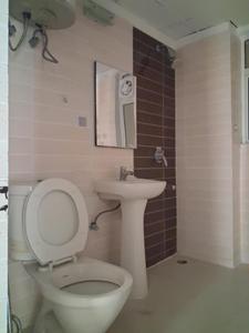 Common Bathroom Image of 1074 Sq.ft 2.5 BHK Apartment / Flat for rent in Amrapali Zodiac, Sector 120 Noida for Rs. 23000