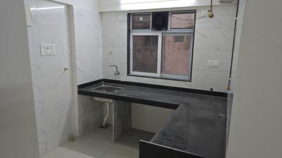 Kitchen Image of 730 Sq.ft 2 BHK Apartment / Flat for sale in Dahisar West Mumbai for Rs. 14800000
