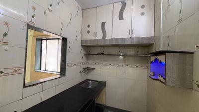Kitchen Image of 750 Sq.ft 1 BHK Apartment / Flat for rent in Hemoo Kalani Society, Pimpri Pune for Rs. 17500
