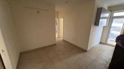 Living Room Image of 650 Sq.ft 2.5 BHK Apartment / Flat for sale in UCHDPL Swamanorath, Wave City Ghaziabad for Rs. 5600000