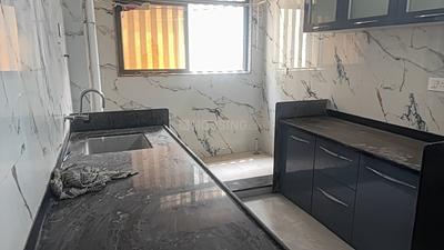 Kitchen Image of 1000 Sq.ft 2 BHK Apartment / Flat for rent in Roongta Grandezza Apartment, Govind Nagar Nashik for Rs. 15000