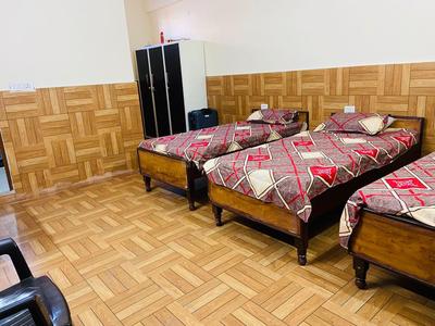 Bedroom Image of Aman pg and rooms  in Nagla Nagli, Noida