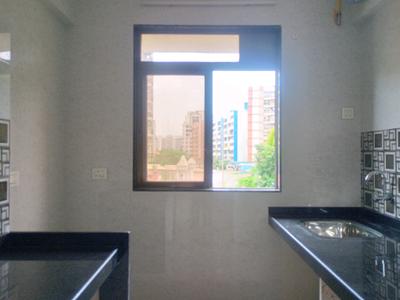 Kitchen Image of 700 Sq.ft 1 BHK Apartment / Flat for sale in Mohan Nano Estates III, Ambernath West Ambernath for Rs. 2700000