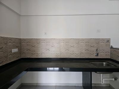 Kitchen Image of 820 Sq.ft 2 BHK Apartment / Flat for rent in Nivasa Enchante Phase 1 &amp; 2, Lohegaon Pune for Rs. 25000
