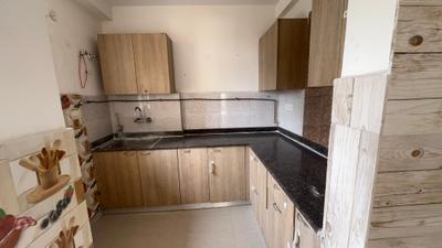 Kitchen Image of 1400 Sq.ft 3 BHK Apartment / Flat for rent in Hawelia Hawelia Valencia Homes, Noida Extension Greater Noida for Rs. 22000