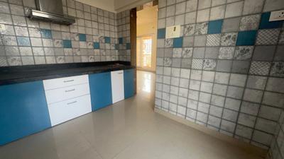 Kitchen Image of 850 Sq.ft 2 BHK Apartment / Flat for rent in Paradise Sai Mannat, Kharghar Navi Mumbai for Rs. 42000