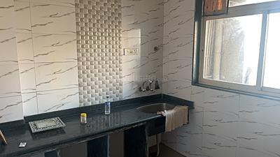 Kitchen Image of 660 Sq.ft 1 BHK Apartment / Flat for sale in Mohan Willows I, Badlapur East Badlapur for Rs. 2750000