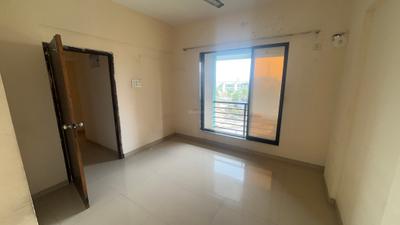 Bedroom Image of 573 Sq.ft 1 BHK Apartment / Flat for rent in Ram Laxman Sadguru Residency, Shilphata Thane for Rs. 11000
