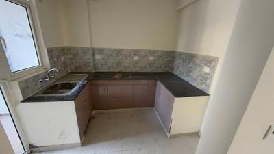 Kitchen Image of 1000 Sq.ft 2 BHK Apartment / Flat for sale in Assotech The Nest, Crossings Republik Ghaziabad for Rs. 8900000