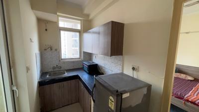 Kitchen Image of 580 Sq.ft 1 BHK Studio for rent in Habitech Panchtatva Phase 1, Noida Extension Greater Noida for Rs. 16999