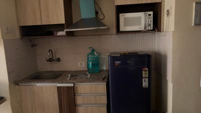 Kitchen Image of 425 Sq.ft 1 BHK Apartment / Flat for rent in Supertech Ecociti, Sector 137 Noida for Rs. 19000