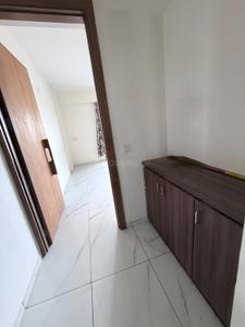 Kitchen Image of 824 Sq.ft 3 BHK Apartment / Flat for sale in Ashwamegh Elite, Sargasan Gandhinagar for Rs. 7900000