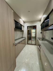 Kitchen Image of 600 Sq.ft 2 BHK Apartment / Flat for sale in Prithvi Anand Kuber Complex Phase 2, Palghar Mumbai for Rs. 2100000