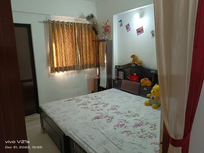 Bedroom Image of 935 Sq.ft 2 BHK Apartment / Flat for sale in Signature Vrajdham, Ujala Circle Ahmedabad for Rs. 3600000