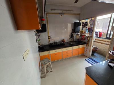 Kitchen Image of 1035 Sq.ft 2 BHK Apartment / Flat for sale in Devnandan Parisar, Adalaj Gandhinagar for Rs. 4700000
