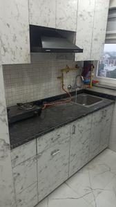 Kitchen Image of 367 Sq.ft 1 RK Studio for rent in DLF Capital Greens, Karampura New Delhi for Rs. 23000
