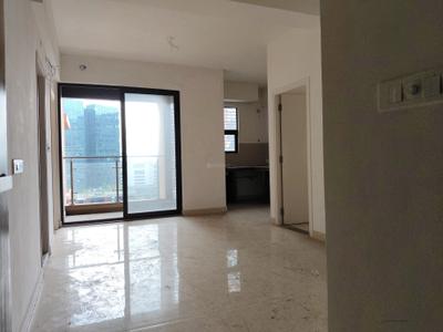 Living Room Image of 1015 Sq.ft 2 BHK Apartment / Flat for sale in Ambuja Ecospace Residencia, New Town Kolkata for Rs. 12200000