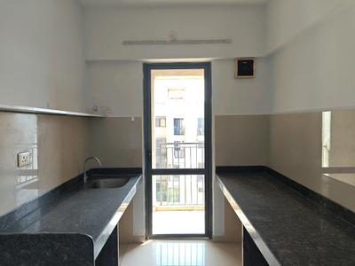 Kitchen Image of 600 Sq.ft 1 BHK Apartment / Flat for sale in Lodha Palava Downtown, Palava Phase 2 Thane for Rs. 2800000