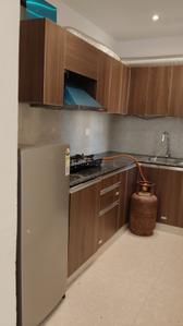 Kitchen Image of 550 Sq.ft 1 BHK Apartment / Flat for rent in Aditya Urban Royale, Bamheta Village Ghaziabad for Rs. 20000