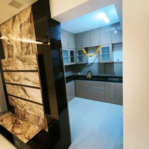 Kitchen Image of 1000 Sq.ft 2 BHK Apartment / Flat for sale in Abhinav Pebbles II, Bavdhan Pune for Rs. 11500000