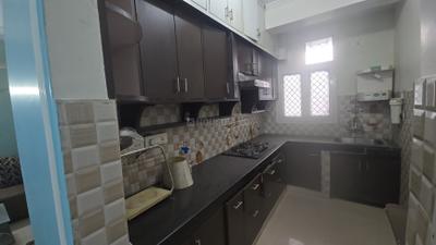 Kitchen Image of 1150 Sq.ft 2 BHK Apartment / Flat for rent in Purvanchal Bhagirathi Apartments, Sector 62 Noida for Rs. 38000