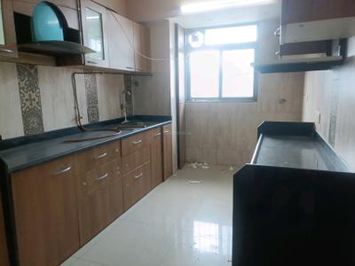 Kitchen Image of 1200 Sq.ft 2 BHK Apartment / Flat for rent in Paradise Sai Symphony, Kharghar Navi Mumbai for Rs. 46000